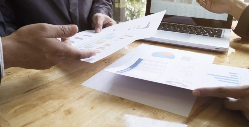 Business people meeting to discuss the situation on the market. 